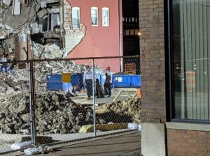 PHOTO Dogs Searching Through The Davenport Apartment Building Debris For Survivors