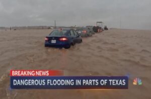 PHOTO Drivers On Freeway In West Texas Lined Up With Water Pooling Up To Their Cars And No Way To Drive Forward