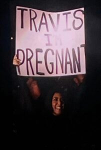 PHOTO Kourtney Kardashian Holding Sign That Says Travis I'm Pregnant