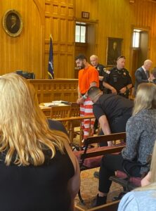 PHOTO Nauman Hussain Walking Away In Handcuffs After Getting Lengthy Prison Sentence