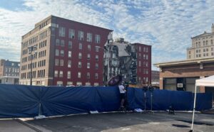 PHOTO Overnight Davenport Police Put Tarp Up To Block View Of Apartment Building From Where Advocates Have Camped Out