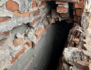 PHOTO Wall Of Davenport Apartment Building Close Up Is All Broken Bricks That Was Featured In Report On Properties Condition