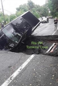 PHOTO Car Drives Into Hole In The Road On Route 9W Tomkins Cove South Of Highland Falls