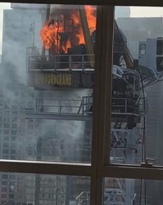 PHOTO Close Up Crane Arm Catching Fire In New York City