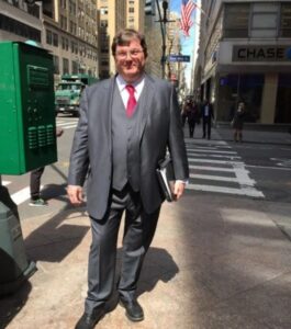 PHOTO Rex Heuermann Dressed Up In Fancy Suit Carrying Work Books In New York And You Couldn't Tell He Was A Serial Killer