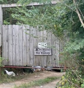 PHOTO Rex Heuermann Had No Warrant No Entry Sign On Gate To His Backyard