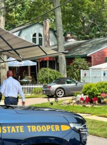 PHOTO Rex Heuermann's Car Still Parked In His Driveway As Law Enforcement Took 100 Guns Out Of His Home