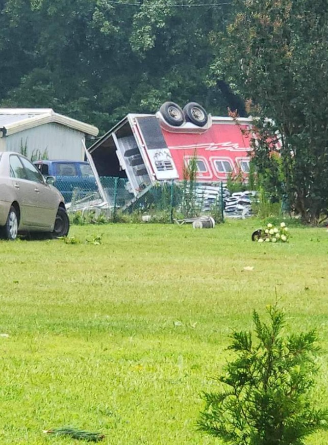 PHOTO Trucks And Cars In Dortches NC Flipped Upside Down By Tornado