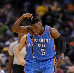 PHOTO Victor Oladipo Pounding His Head In An OKC Thunder Uniform