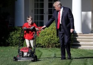 PHOTO Barron Trump Is Now Mowing Lawns For Donald Trump With Ear Plugs And Safety Glasses