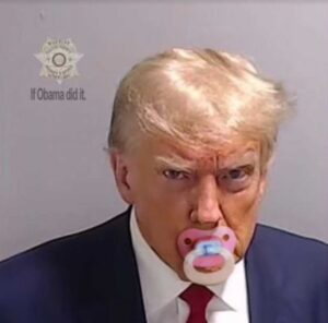 PHOTO Donald Trump With A Binky In His Mouth During Fulton County Mugshot