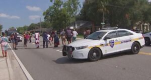 PHOTO Jacksonville FL Residents Running To Crime Scene After Ryan Palmeter Opened Fire On Dollar General