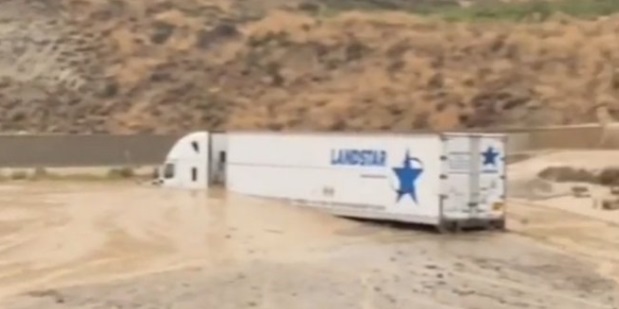 PHOTO Semi Truck Stuck In Mud And Floodwaters On Highway 58 In California 