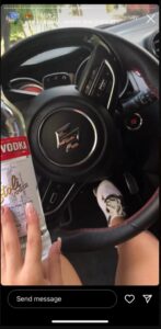 PHOTO Wander Franco's Girlfriend Holding Bottle Of Vodka While Driving $100K Sports Car