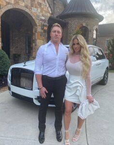 PHOTO Kroy Biermann With His Blonde Gold Digger Wife Outside Their Excessive Brick Mansion