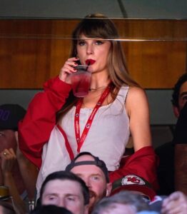 PHOTO Taylor Swift Sipping A Drink In Travis Kelce's Suite