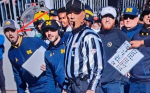 PHOTO Connor Stalions Cannot Hide As A Low Level Staffer Standing Right Next To Michigan's OC And DC