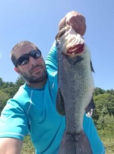 PHOTO Robert Card At A Lake Fishing After Catching 20 Pound Fish