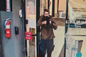 PHOTO Robert Card Pointing His Gun Before He Walked Into Bowling Alley Door And Started Shooting