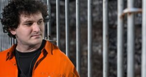 PHOTO Sam Bankman-Fried Roaming Prison In Signature Orange Jumpsuit
