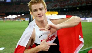 PHOTO Shawn Barber Throwing Up Some Signs After Winning A Match