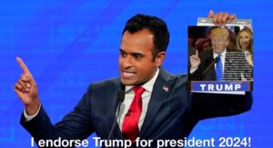 PHOTO Vivek Ramaswamy Holding Up A Picture Of Donald Trump Whole Endorsing Him For President