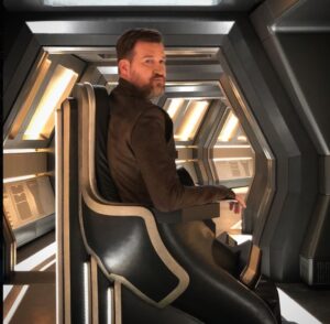 PHOTO Kenneth Mitchell Sitting In A Star Trek Chair