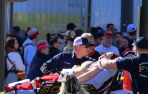 PHOTO Woman With Gunshot Wounds Loaded Onto Stretcher At Chiefs Parade