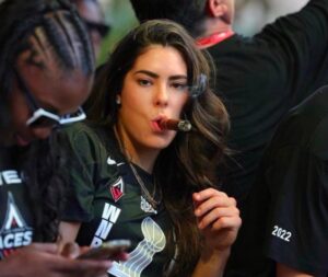 PHOTO Kelsey Plum Smoking A Cigar After Divorce Like Nothing Happened