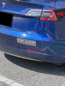 PHOTO Tesla Owner Driving Around With Bumper Sticker That Says I Bought This Before We Knew Elon Was Crazy