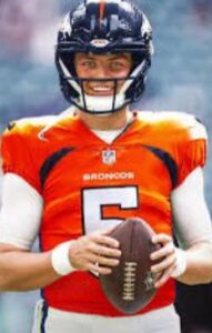 PHOTO Zach Wilson Grinning In A Denver Broncos Uniform