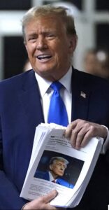 PHOTO Donald Trump Holding A Paper With A News Story With His Face On It