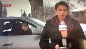 PHOTO Emma Daybell Sticking Tongue Out At TV News Camera Backing Out Of Driveway