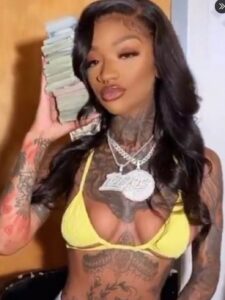 PHOTO Rapper Enchanting Holding Giant Stacks Of 100 Dollar Bills