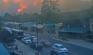 PHOTO Ruidoso Residents Bailing Out Of Town As Fire Spreads In The Background