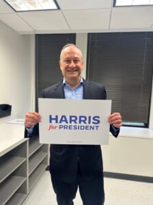 PHOTO Doug Emhoff Holding Harris For President Sign