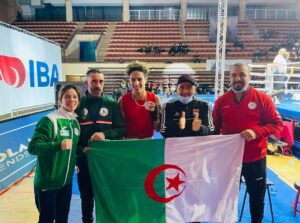 PHOTO Imane Khelif With His Teammates And Home Country Flag