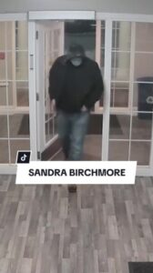 PHOTO Of Matthew Farwell Walking Into Sandra Birchmore's Apartment Building With A Mask On