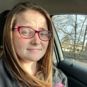 PHOTO Sandra Birchmore In Her Car Wearing A Northface Jacket