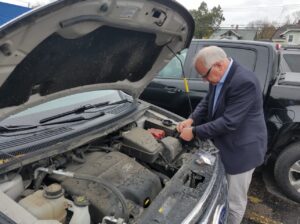 PHOTO Tim Walz Working Under The Hood Of His Ford SUV