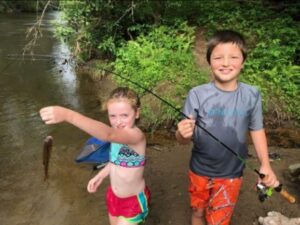 PHOTO Colt Gray At 10 Years Old Fishing With His Sister