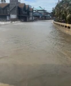 PHOTO Of Water Flowing On Dock Street In Cedar Key Florida Like A River