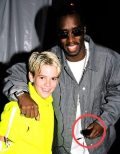 PHOTO P Diddy With A Very Innocent Looking Aaron Carter