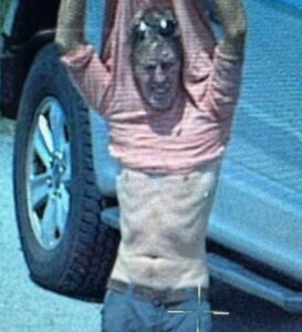 PHOTO Ryan Wesley Routh Holding His Shirt Up As FBI Pointed Their Guns At Him