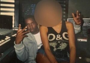 PHOTO Sean Diddy Combs With One Of His Slaves In Recording Studio