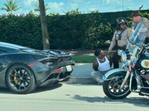 PHOTO Tyreek Hill Sitting On A Curb Handcuffed Like Why Are You Detaining Me
