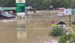 PHOTO Gas Station In Hartford Tennessee Flooded Up To The Sign