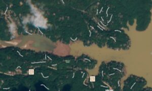 PHOTO Hurricane Helene Debris Piled Up At The East End Of The Lake Where The Broad River Flows Into Lake Lure