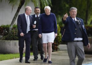 PHOTO Mike Jeffries Smiling Walking Out Of Court Wearing White Shorts