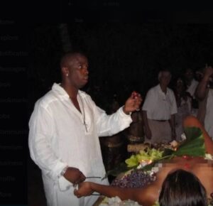 PHOTO P Diddy Eating Fruit Over A Woman Laying Covered In Only Leaves And Fruit